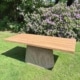 Rechthoekige outdoor tafel van gerecycled teakhout met wicker kolompoot